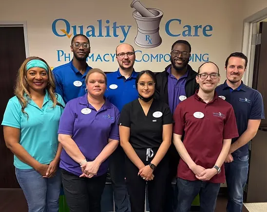 The Quality Care Pharmacy team behind the pharmacy counter in Wylie